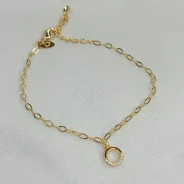 PULSEIRA COM PINGENTE DE CIRCULO 1/2 LISO 1/2 CRAVEJADO