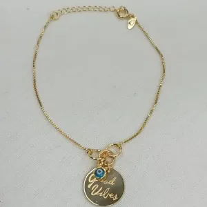 PULSEIRA GOOD VIBES E OLHO GREGO