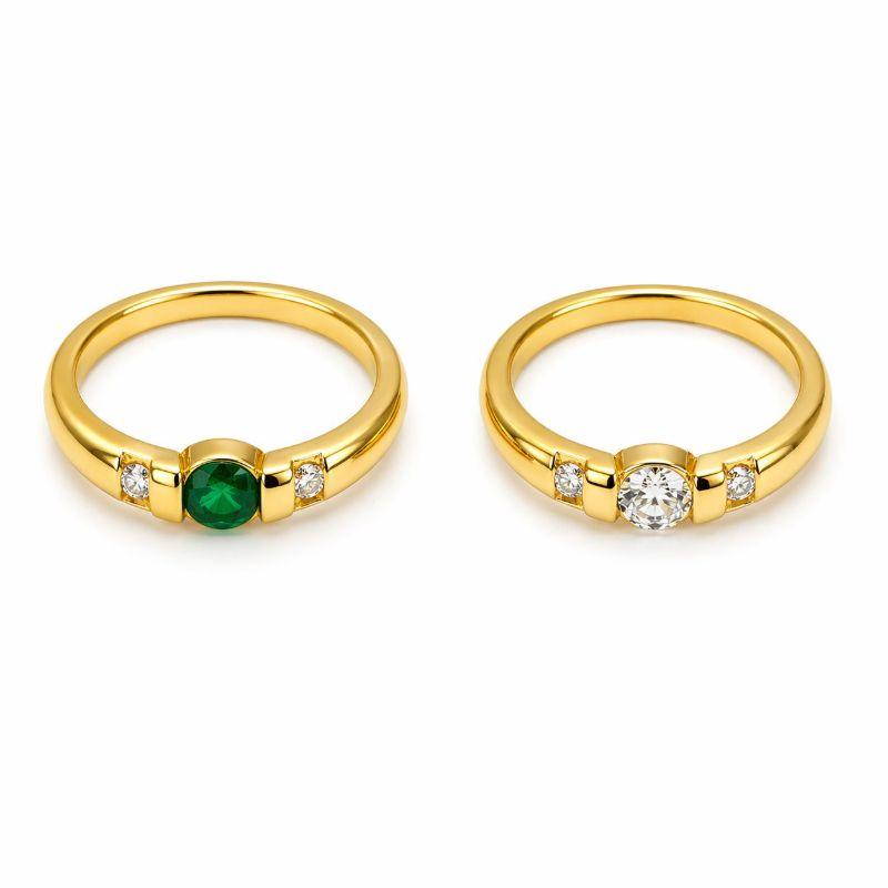 ANEL LISO C/ UMA ZIRCONIA REDONDA CENTRAL E DUAS NA LATERAL